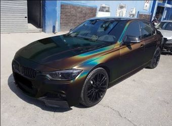 Laser flip gloss black vinyl wrap by the roll