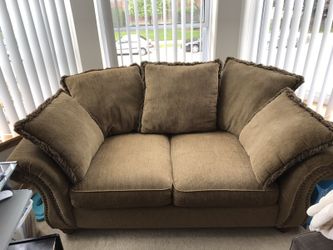Brown love seat couch