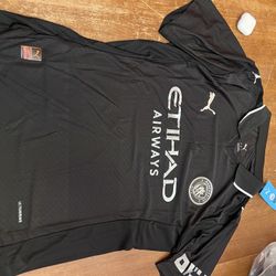 Manchester city player version away black