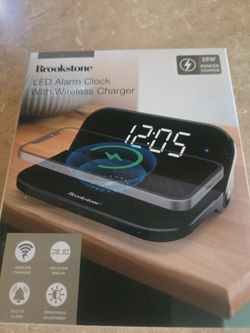 Led alarm clock with wireless phone charger