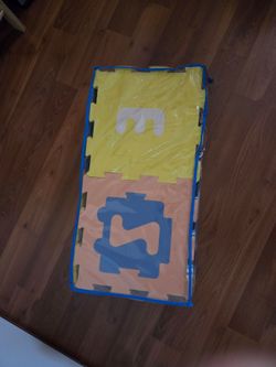 Puzzle letter floor mat