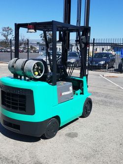 Mitsubishi Forklift 5000 lb capacity 3 stage side shift runs good no mechanical Problems� This forklift has been well maintained ready to go to work