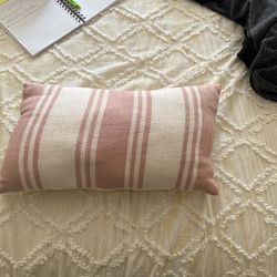 Pink and white cushion