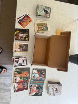 Box of baseball football hockey and basketball cards mint condition pick up in Orting