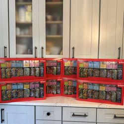 Pokemon Prismatic Evolutions 8 Mini-Tins with Promo Cards