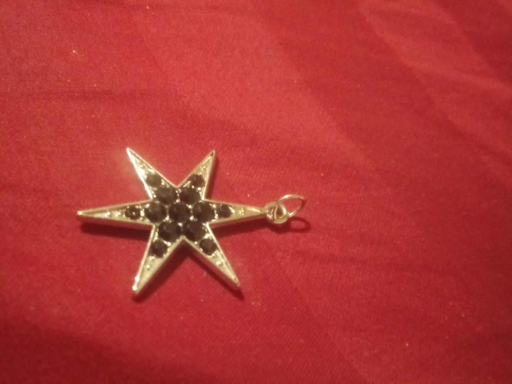 Star charm for a necklace