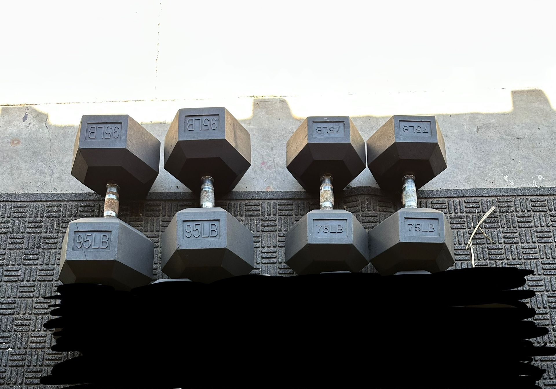 Pairs of 95,75 dumbbells weights total 340lbs total