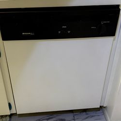 White Frigidaire dishwasher. 
