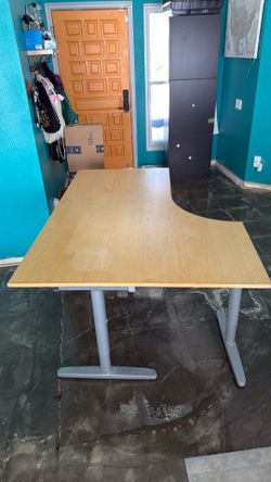 IKEA Galant corner desk in birch with the adjustable grey T-legs