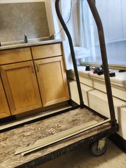 Industrial strength flatbed push cart with four wheels furniture mover