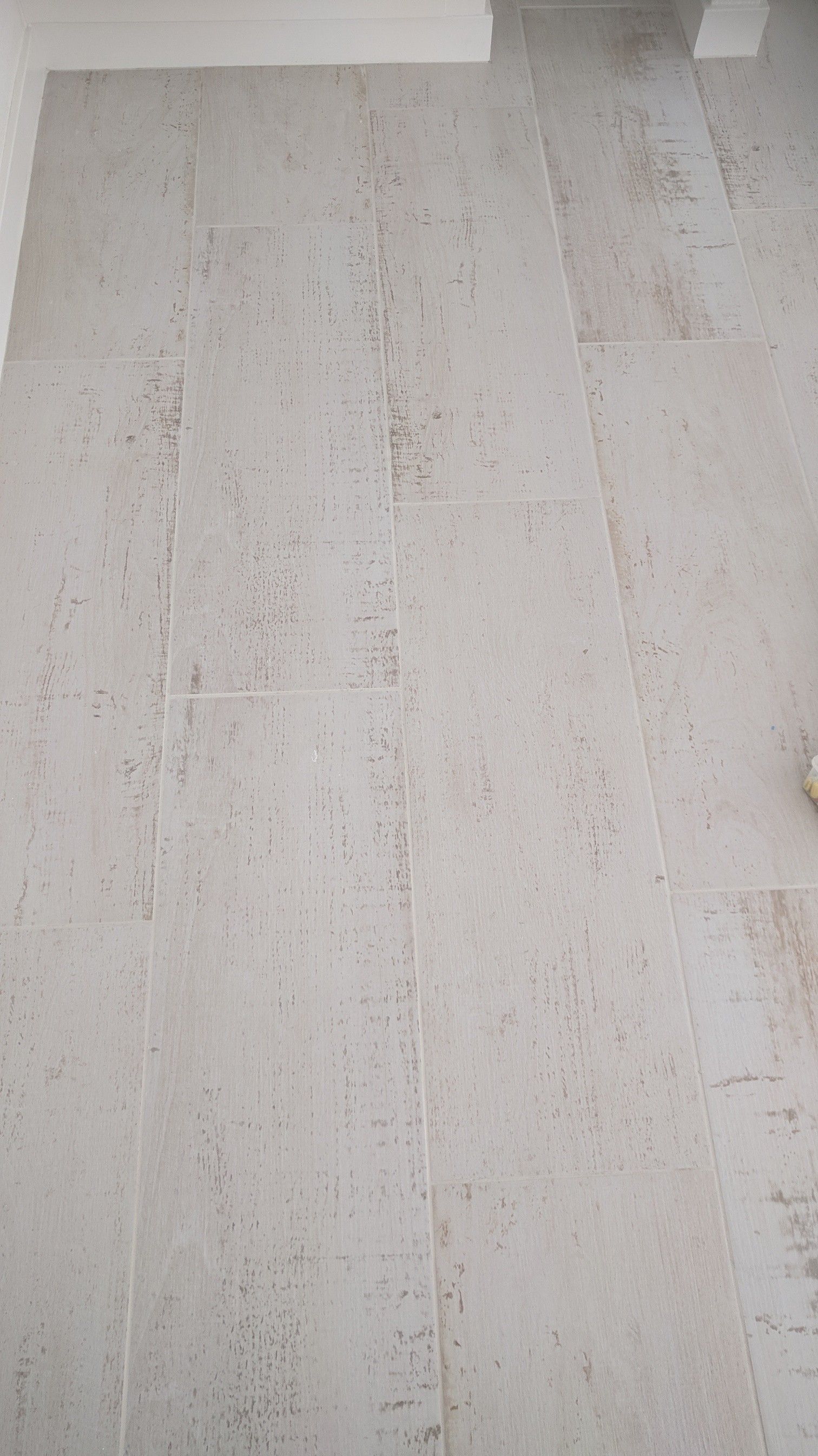 White wood plank porcelain tiles