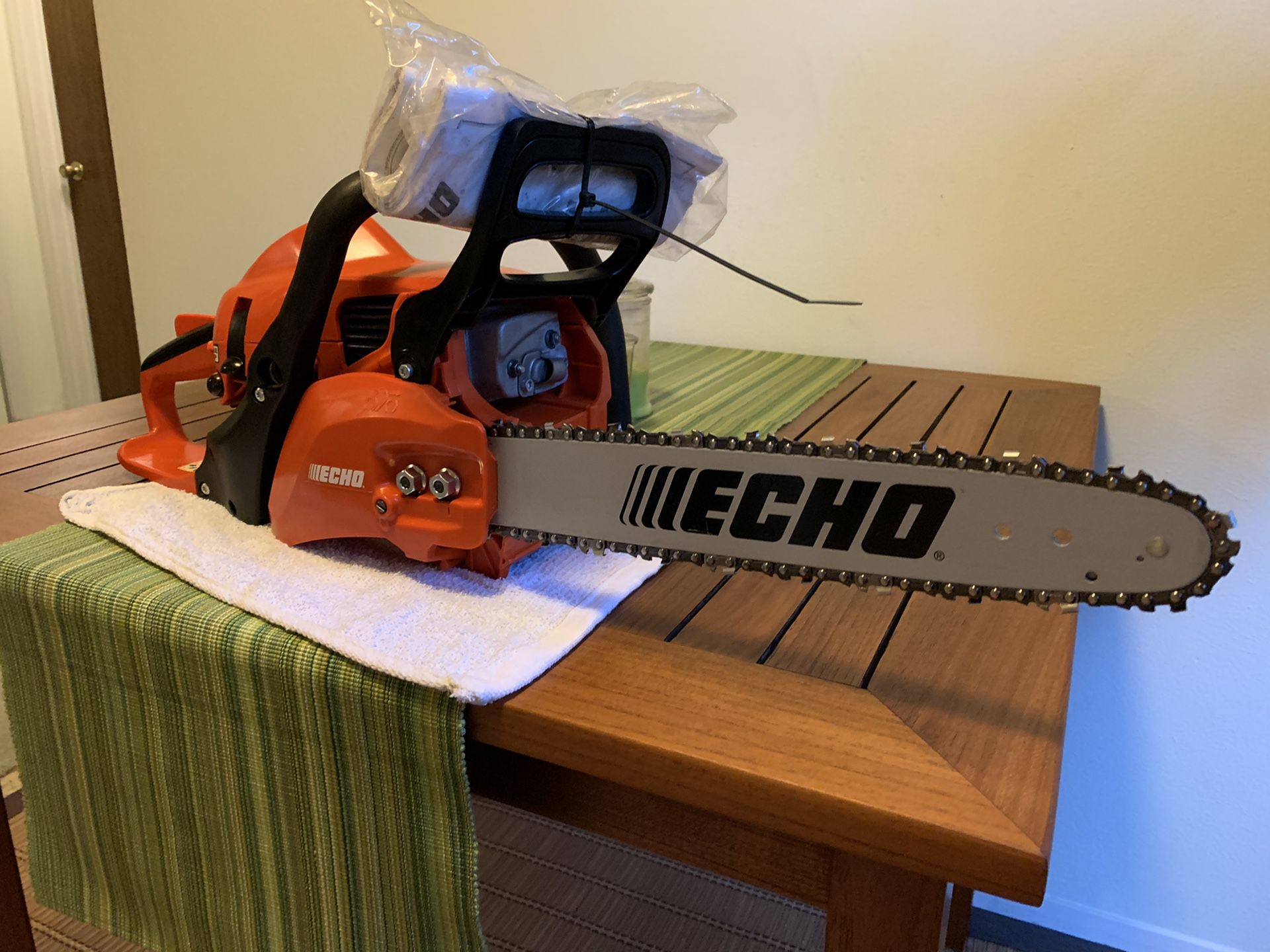 Echo 310 gas 14” chainsaw.