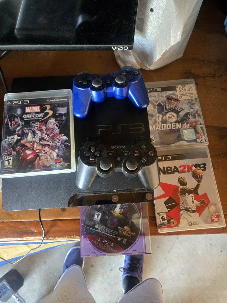 Playstation 3 With 4 Games And 2 Controllers