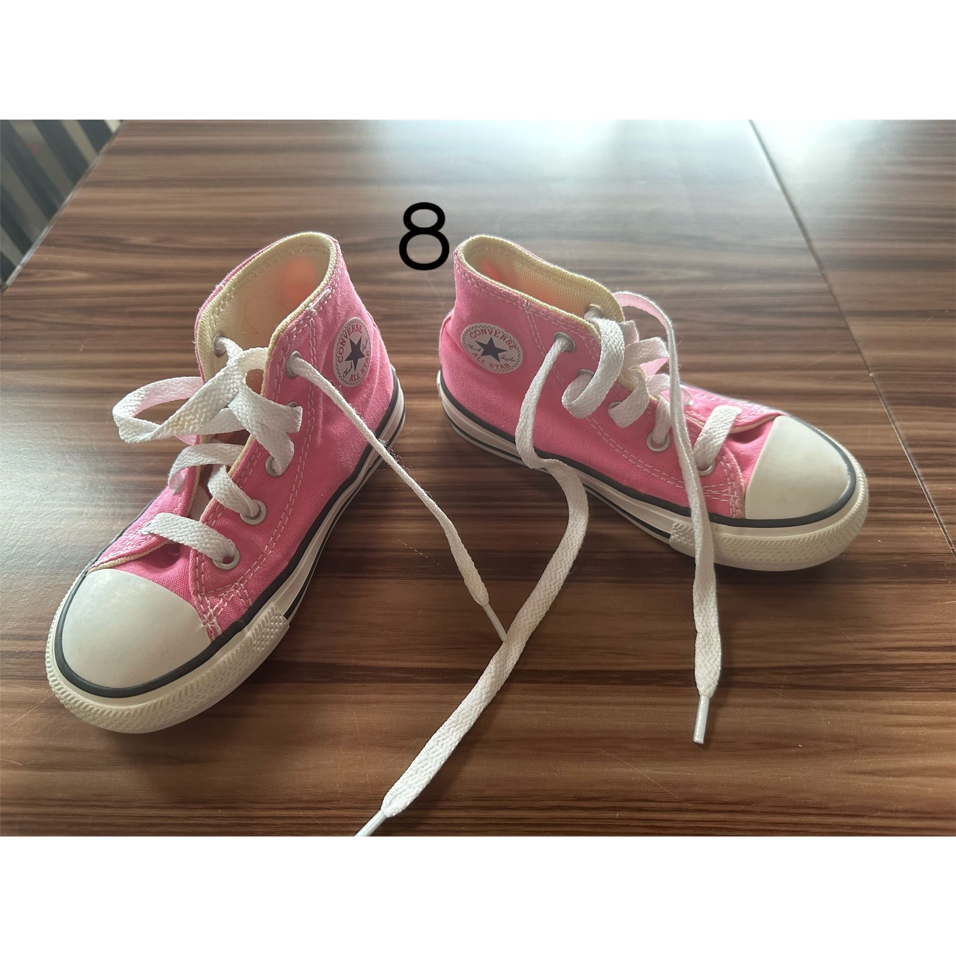 Pink Converse High tops 