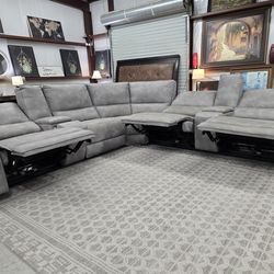 7-Piece Power Reclining Gray Leather Sectional – Headrests + Consoles