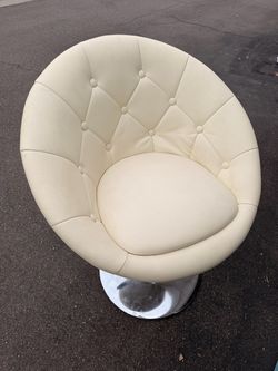 Cream Tufted Swivel Pod Chair