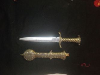 Decorative Dagger with Ornate Brass Scabbard