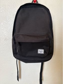 Herschel supply co. Black backpack with red inside