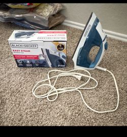 Iron with water spray