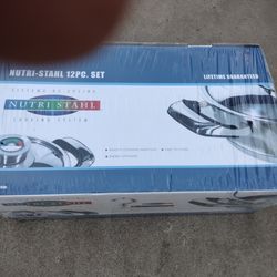 New high-end 12-piece cookware set in the box sealed no offers no trade 75th Ave Indian School serious buyers only please lifetime guarantee