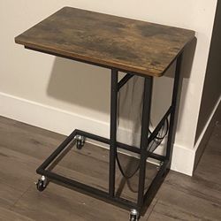 Retro Industrial Sofa/Nightstand /Computer C Table With Matte Black Metal Base, Rustic Brown Wood Top With The Side Pocket And Wheels H27”xW22”xD14”