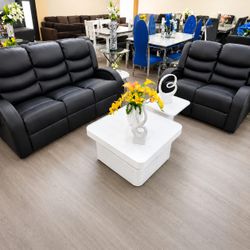 Black leather 2 piece reclining sofa and loveseat