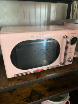 Pink retro microwave