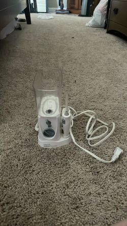 Water pick flosser