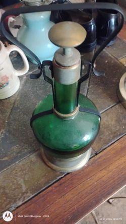 Liquor bottle with built in music box on the bottom of bottle