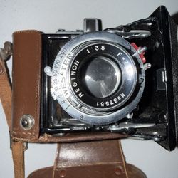     Vintage 120 Folding Camera w/ Reginon 75mm f3.5 + Semi Leotax Case