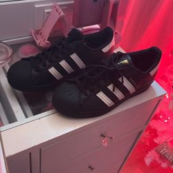 Adidas black super stars