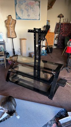 Glass and metal tv stand with 40 inch Magnavox TV included