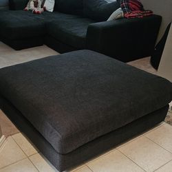 Black Oversized Ottoman On Wheels
