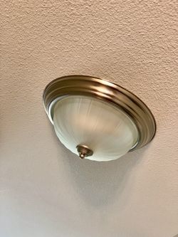 Brushed nickel light fixture with alabaster shade flush mount