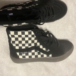 Checkered Vans High tops