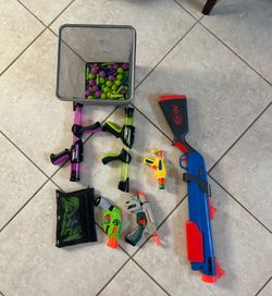 Variety of nerf guns with bullets