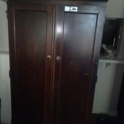 Free Brown Wood Wardrobe Pick Up Sunday After 3pm.