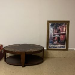 Wall Picture In A Frame And A Coffee Table