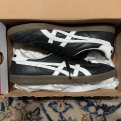 Black and white Onitsuka Tiger Mexico 66 trainers with box