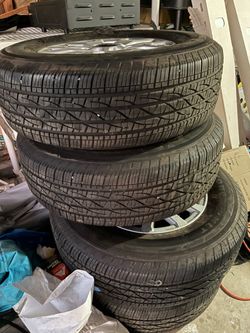2024 Toyota Tacoma factory rims and tires (4) like new