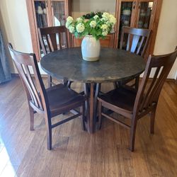 Natural stone table with matching chairs