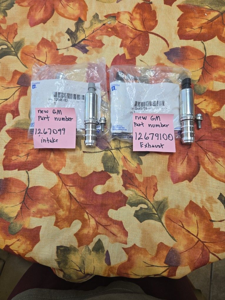 Intake And Exhaust Variable Valve Timing (VVT) Solenoid With Seal Retainer And Bolt 2.O 2.4 L4 GM OEM new $60 For Pair