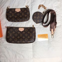Louis Vuitton Handbag, Clutch, And Coin Wallet