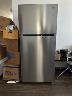 used for one year. 18 cu. ft. Top Freezer Refrigerator used for one year.