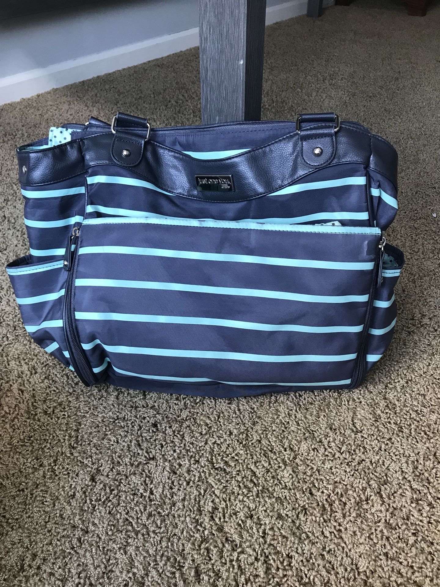 Baby diaper bags and changing pads