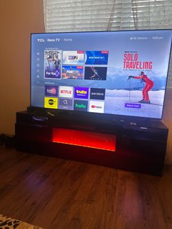 65 inch TCL Tv, Fireplace tv stand, Floor mirror