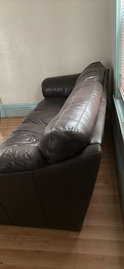 Natuzzi dark brown leather sofa