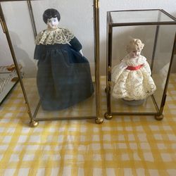 Porcelain Dolls In Glass Case 