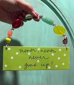 Never Never Never Give Up Hanging Sign