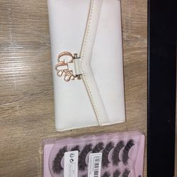 White Guess Wallet, and free lashes.